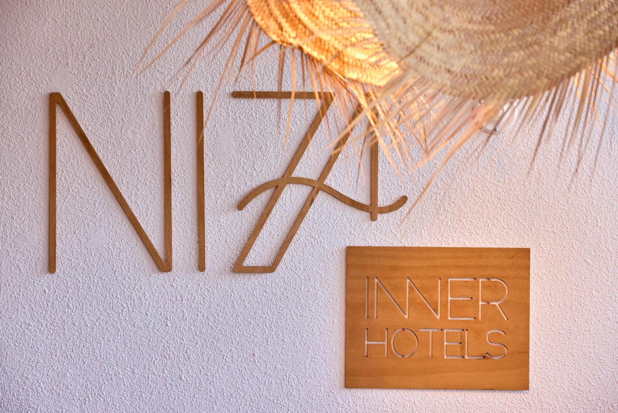 Inner Niza Paguera Bagian luar foto